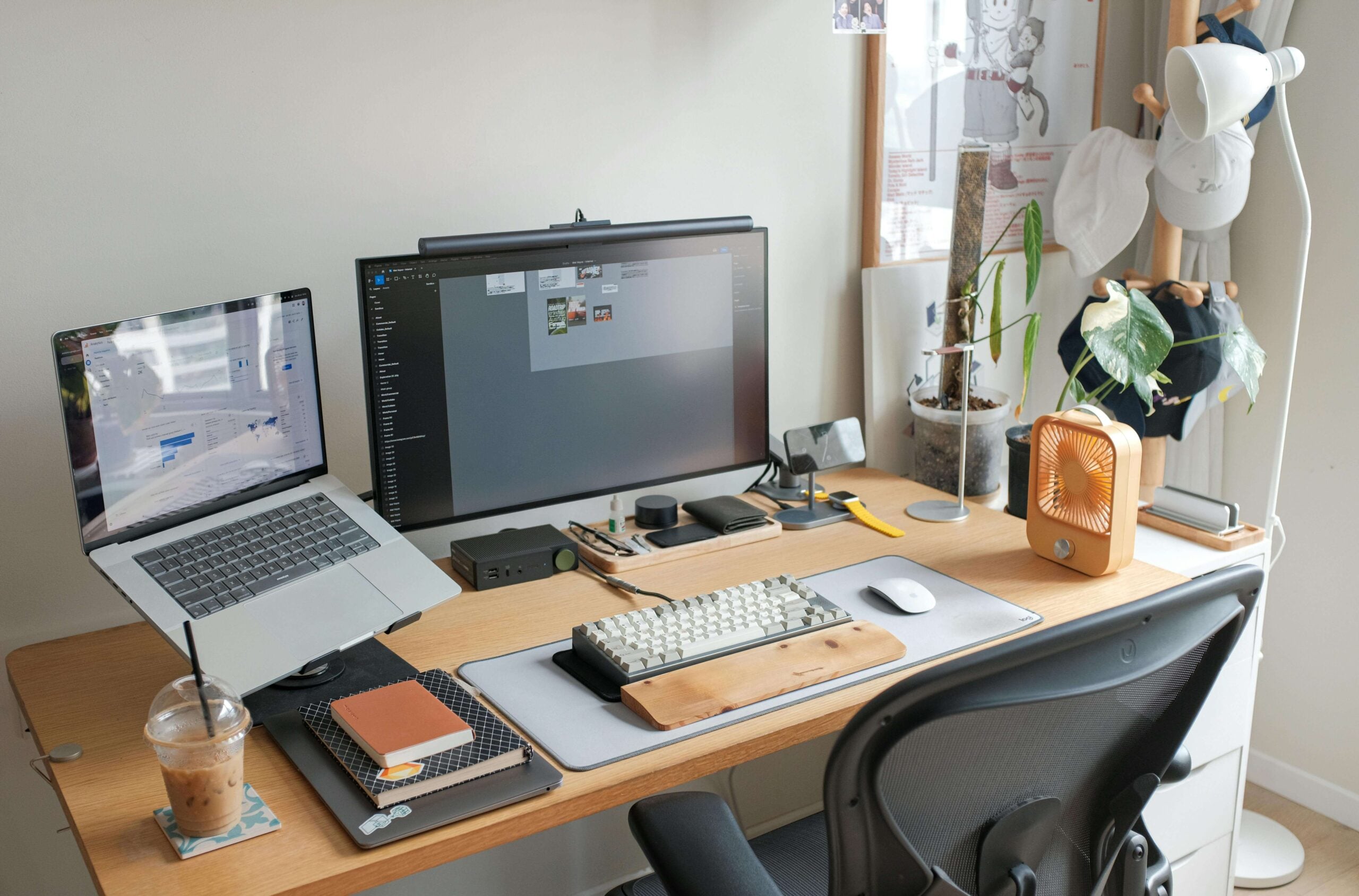 desk with computers and office equipment